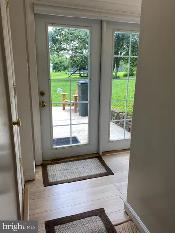 a view of a room that has a window