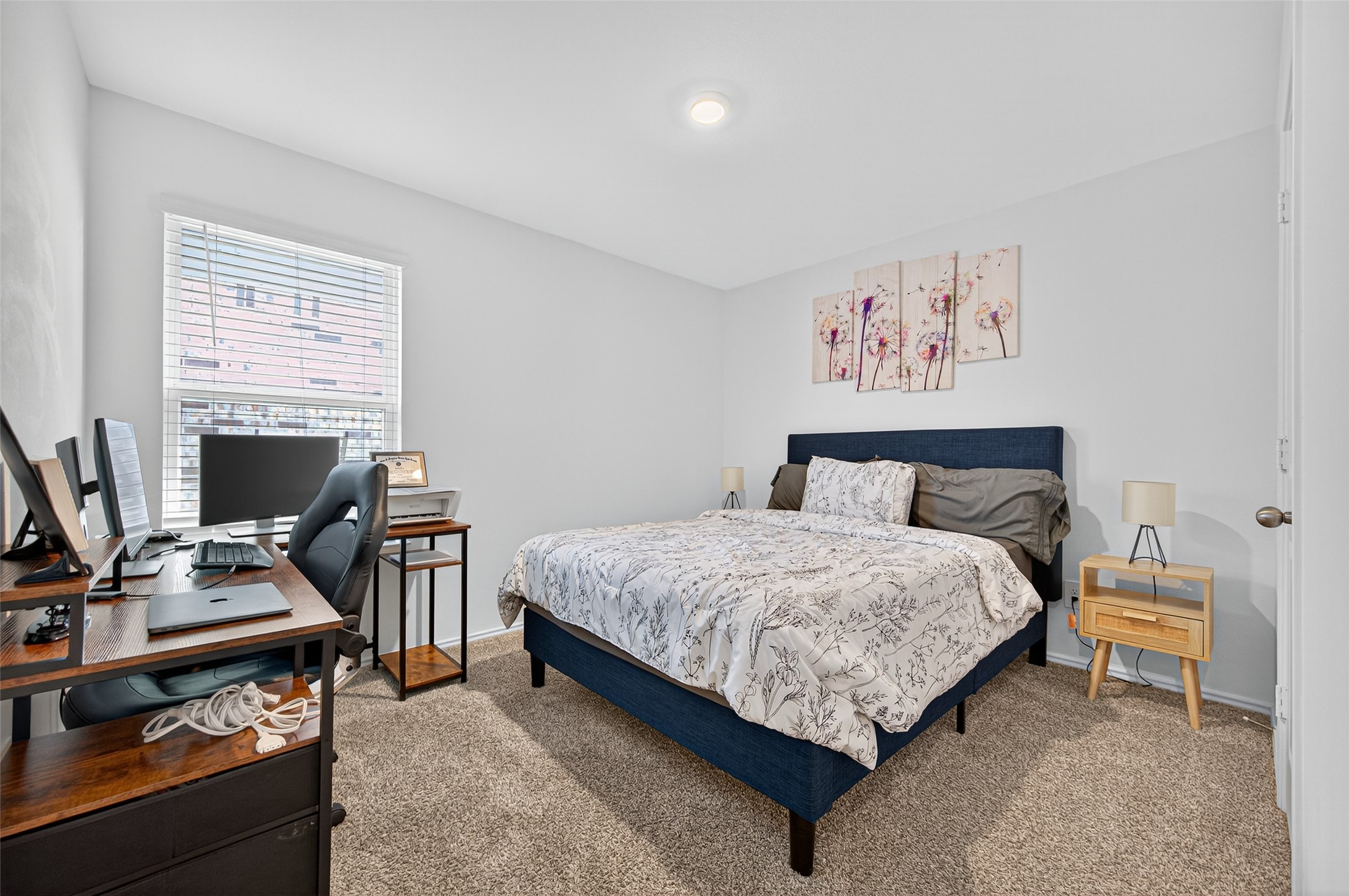 5323 Pinecliff Grove Court Spring, TX 77373 - Photo 25 of 41 a bedroom with a bed and a desk