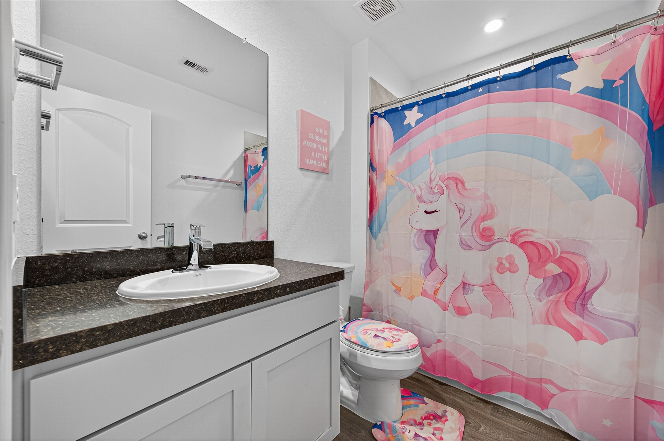 5323 Pinecliff Grove Court Spring, TX 77373 - Photo 26 of 41 a bathroom with a sink and a mirror
