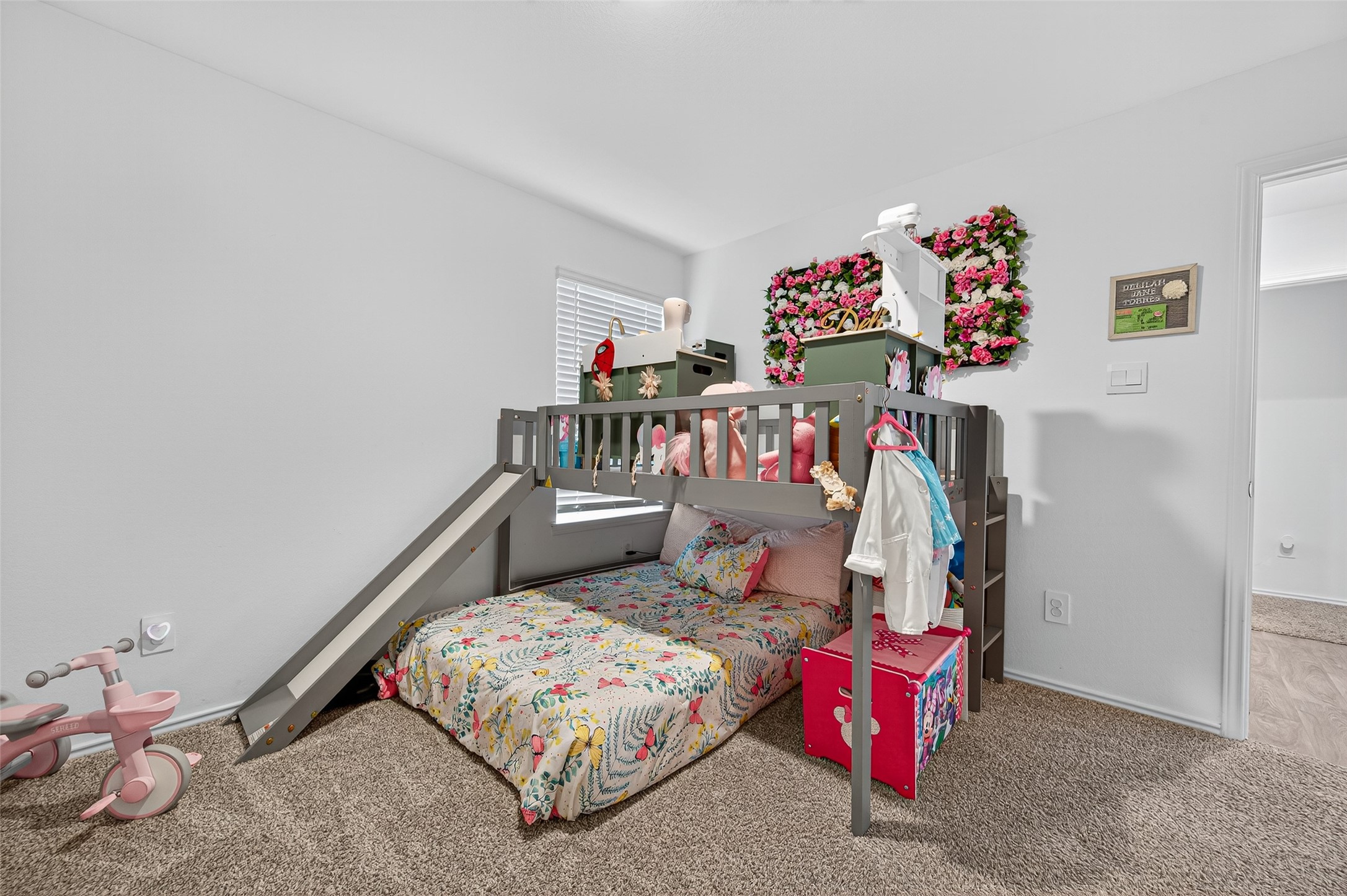 5323 Pinecliff Grove Court Spring, TX 77373 - Photo 28 of 41 a bedroom with a bed and a white wall painting