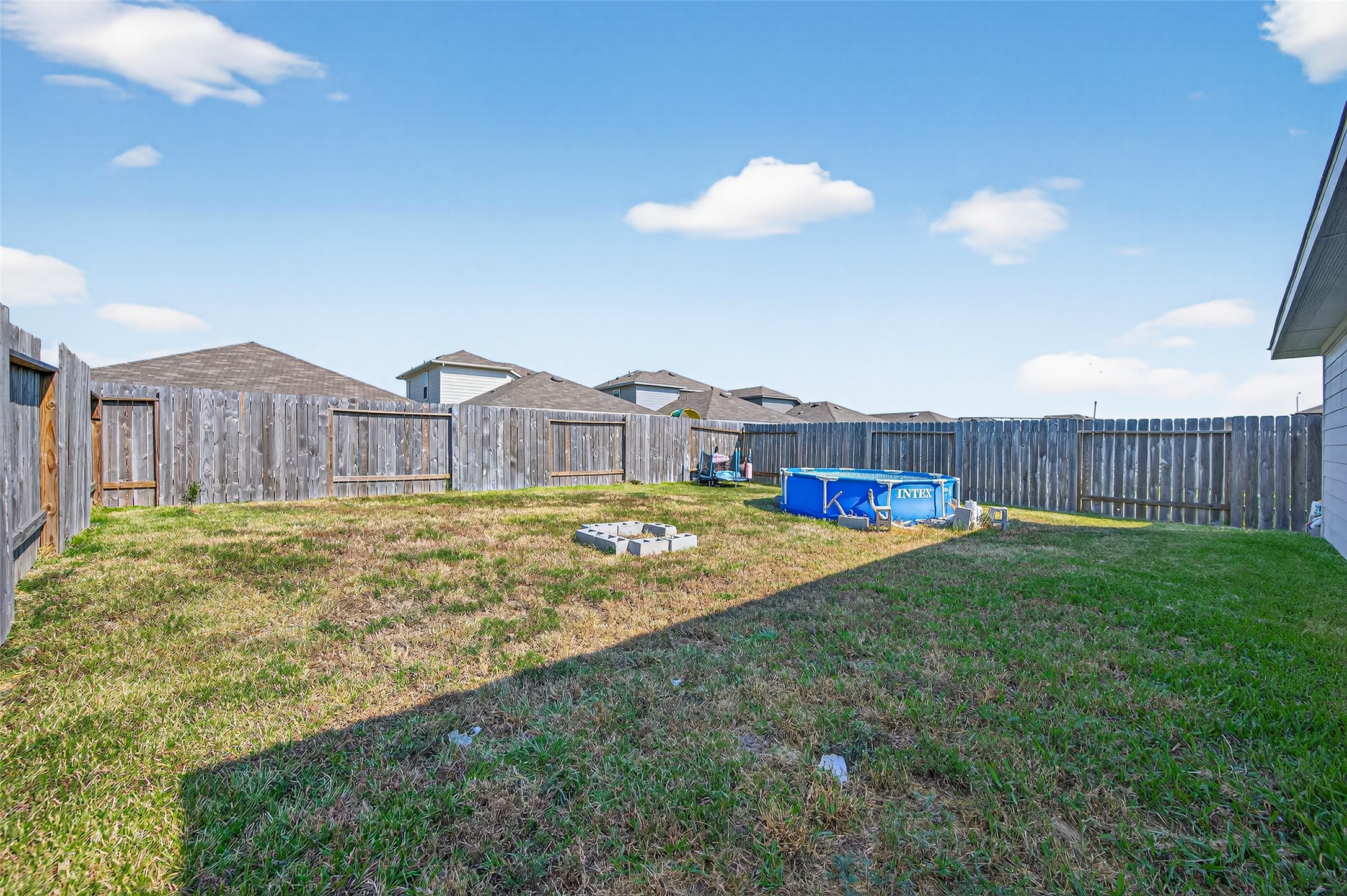 5323 Pinecliff Grove Court Spring, TX 77373 - Photo 30 of 41 a swimming pool with outdoor seating and yard