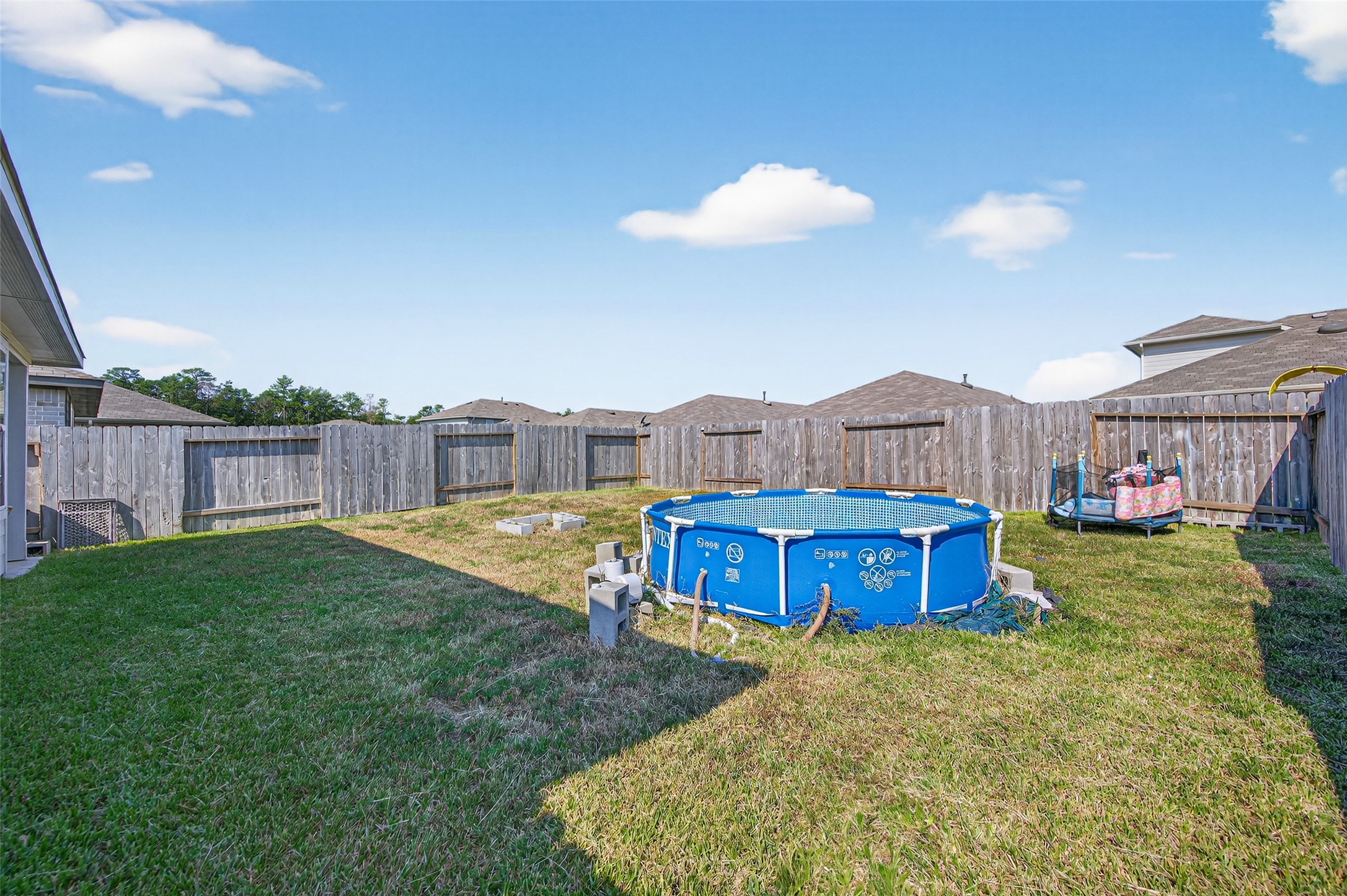 5323 Pinecliff Grove Court Spring, TX 77373 - Photo 31 of 41 a view of a house with backyard and tub