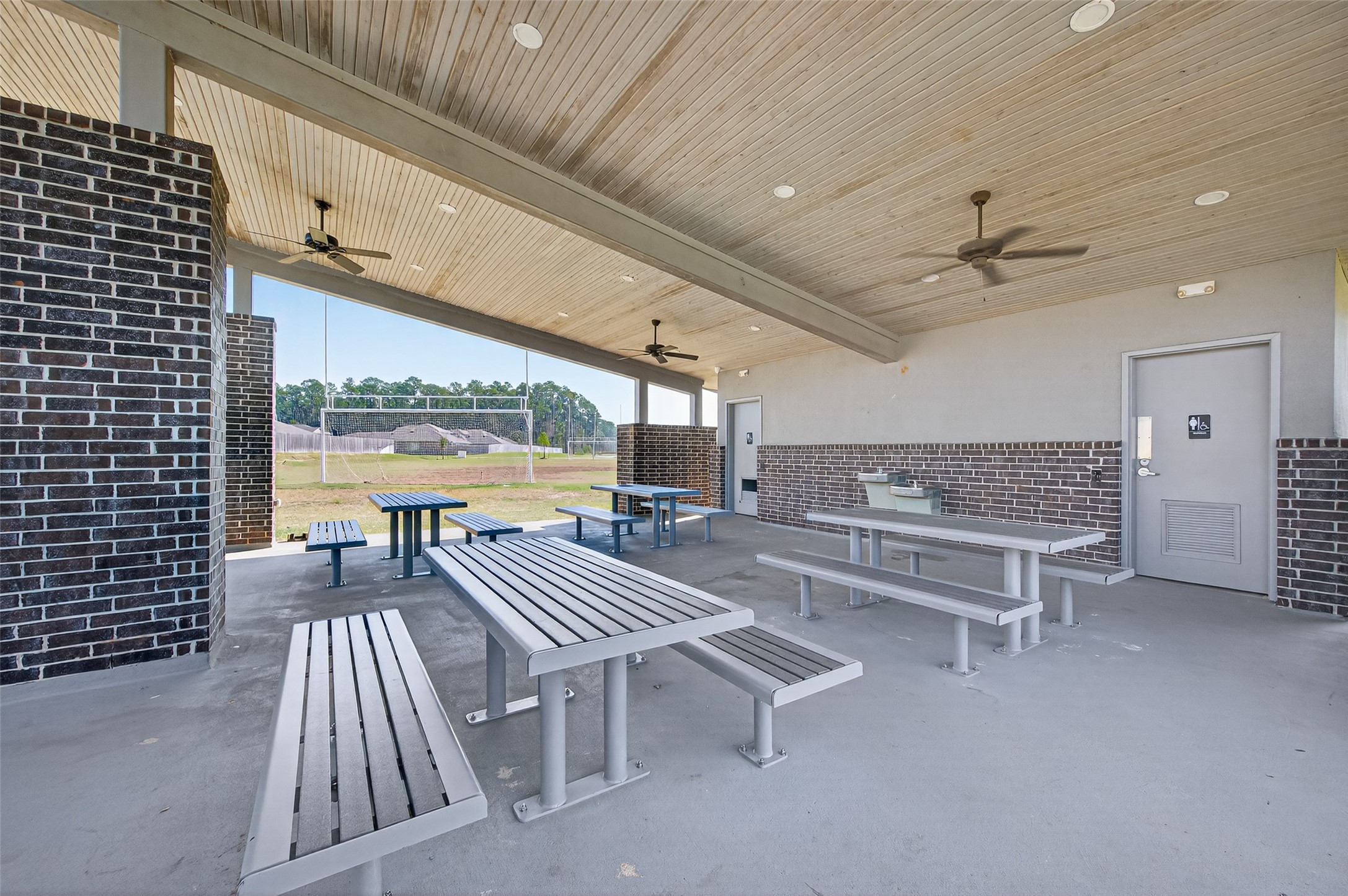 5323 Pinecliff Grove Court Spring, TX 77373 - Photo 36 of 41 a living room with a couch and a table