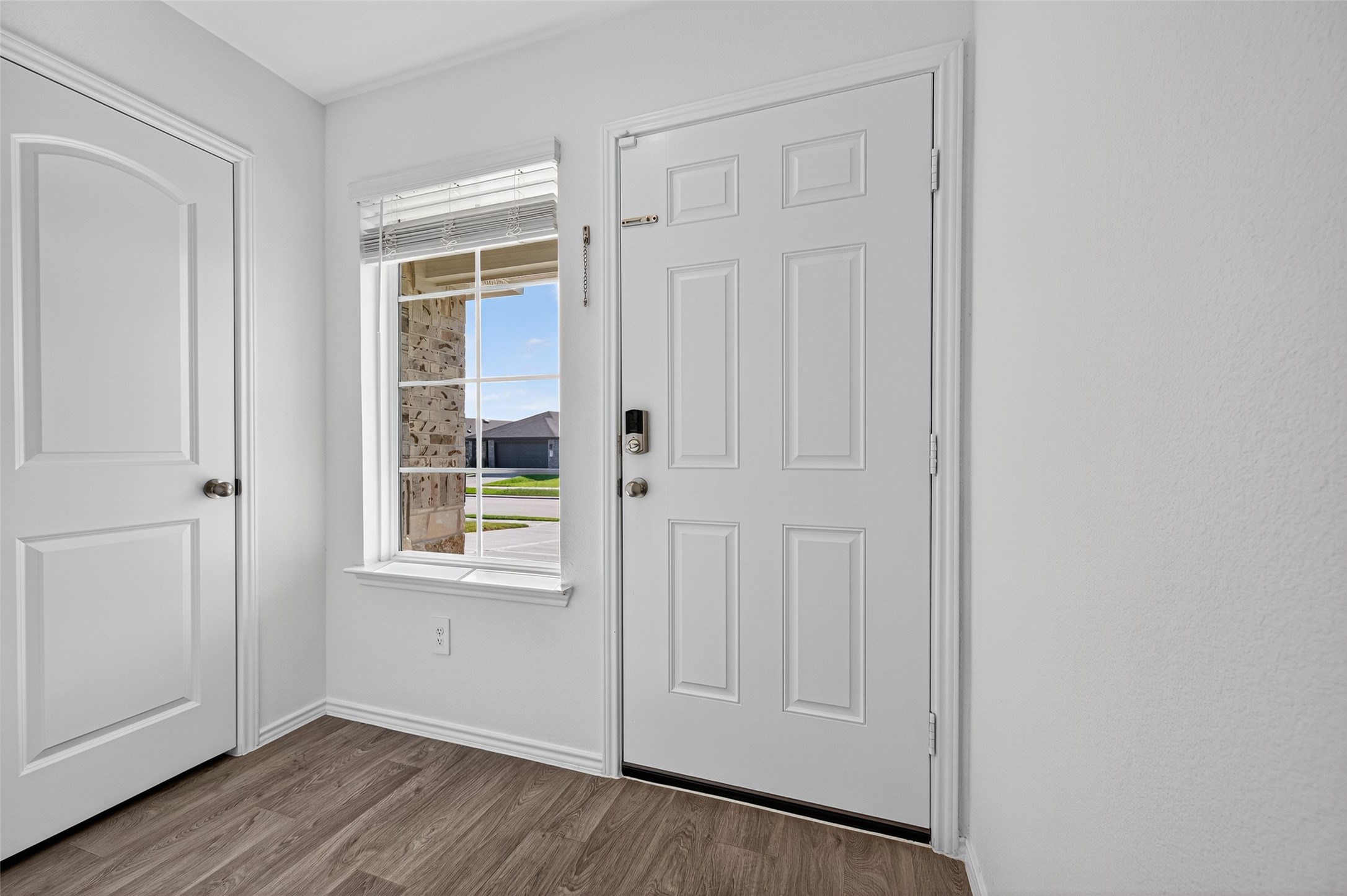 5323 Pinecliff Grove Court Spring, TX 77373 - Photo 5 of 41 an empty room with wooden floor closet and windows