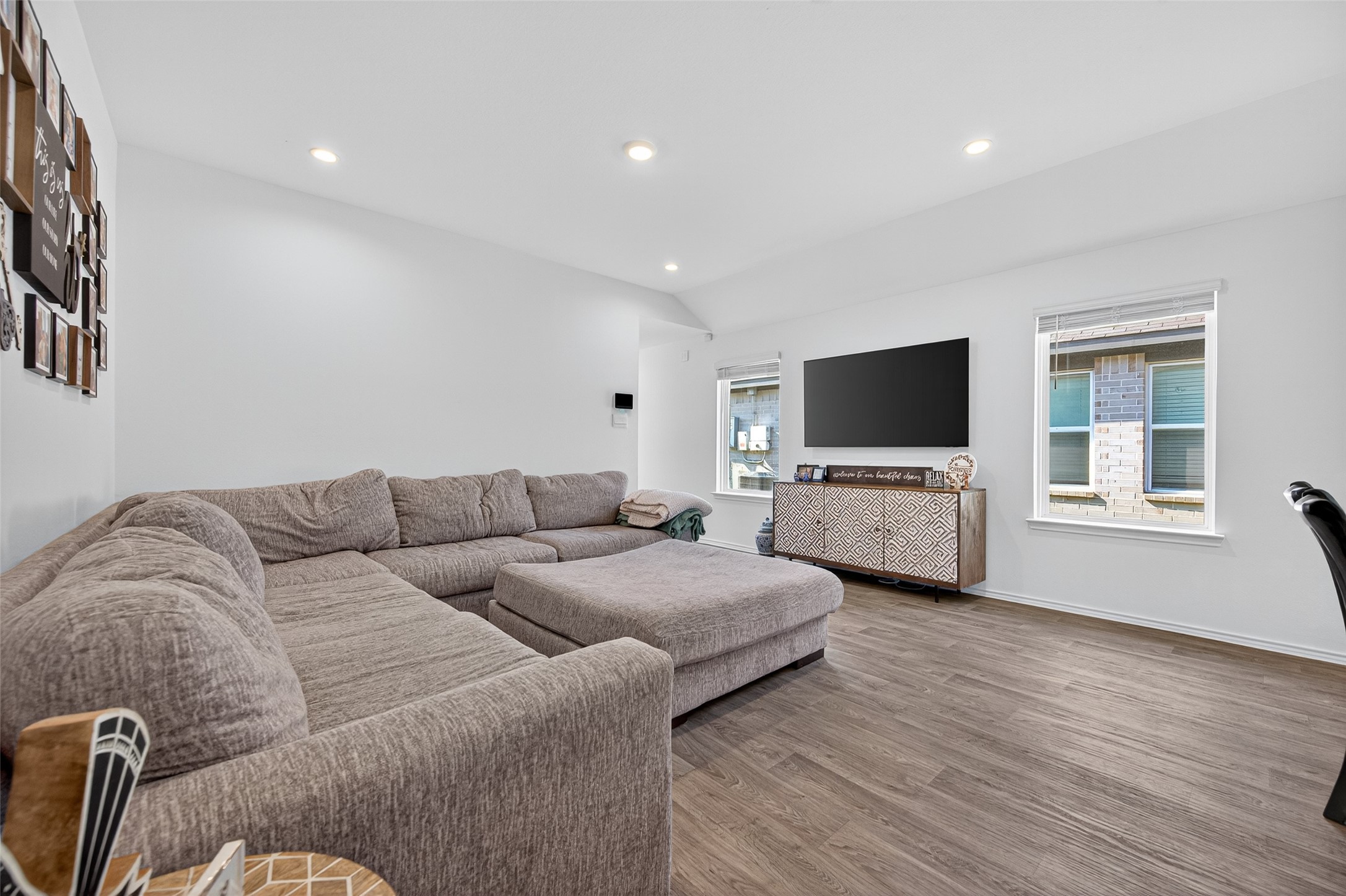 5323 Pinecliff Grove Court Spring, TX 77373 - Photo 8 of 41 a living room with furniture and a flat screen tv