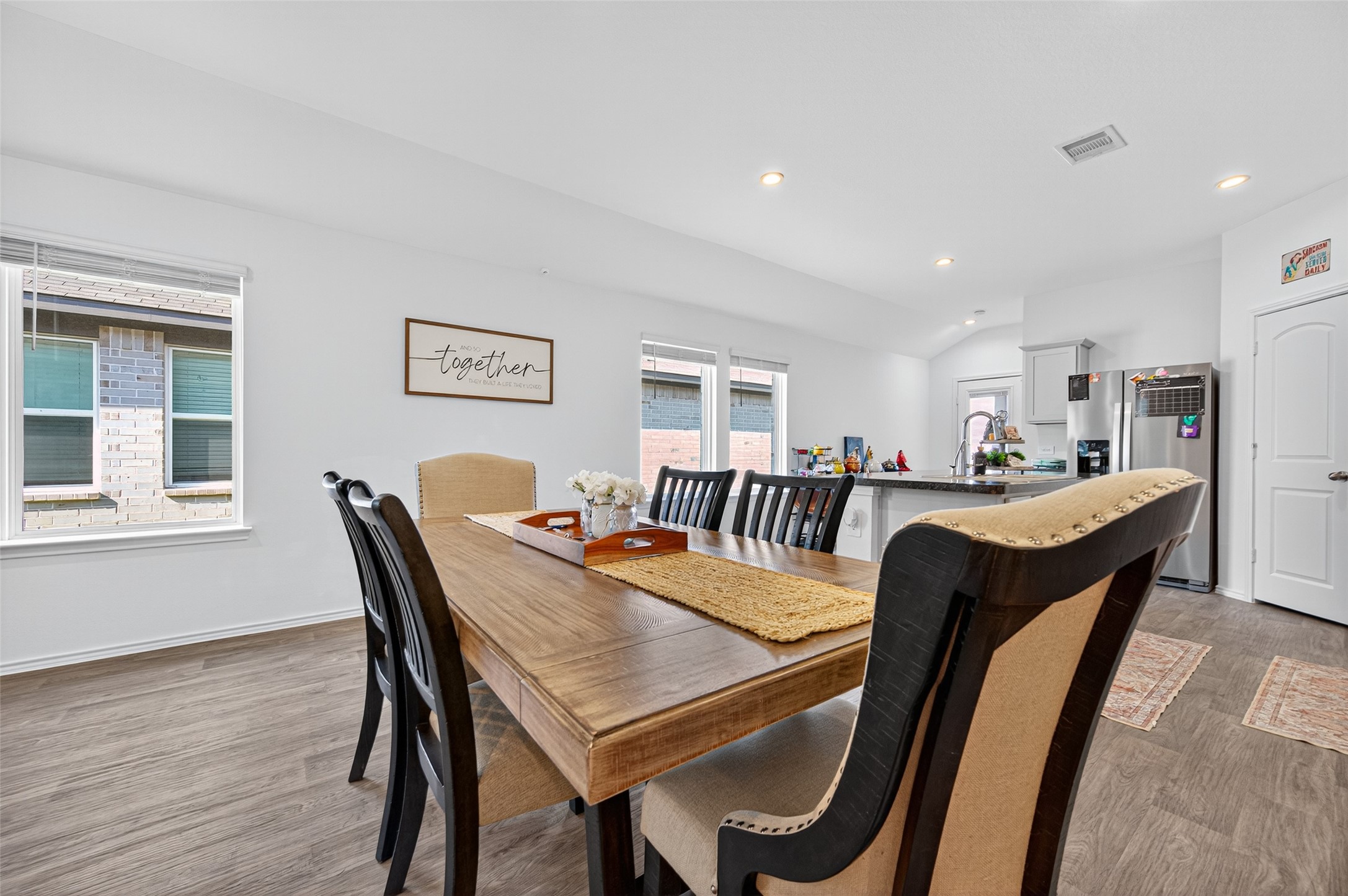 5323 Pinecliff Grove Court Spring, TX 77373 - Photo 9 of 41 a view of a dining room with furniture and wooden floor