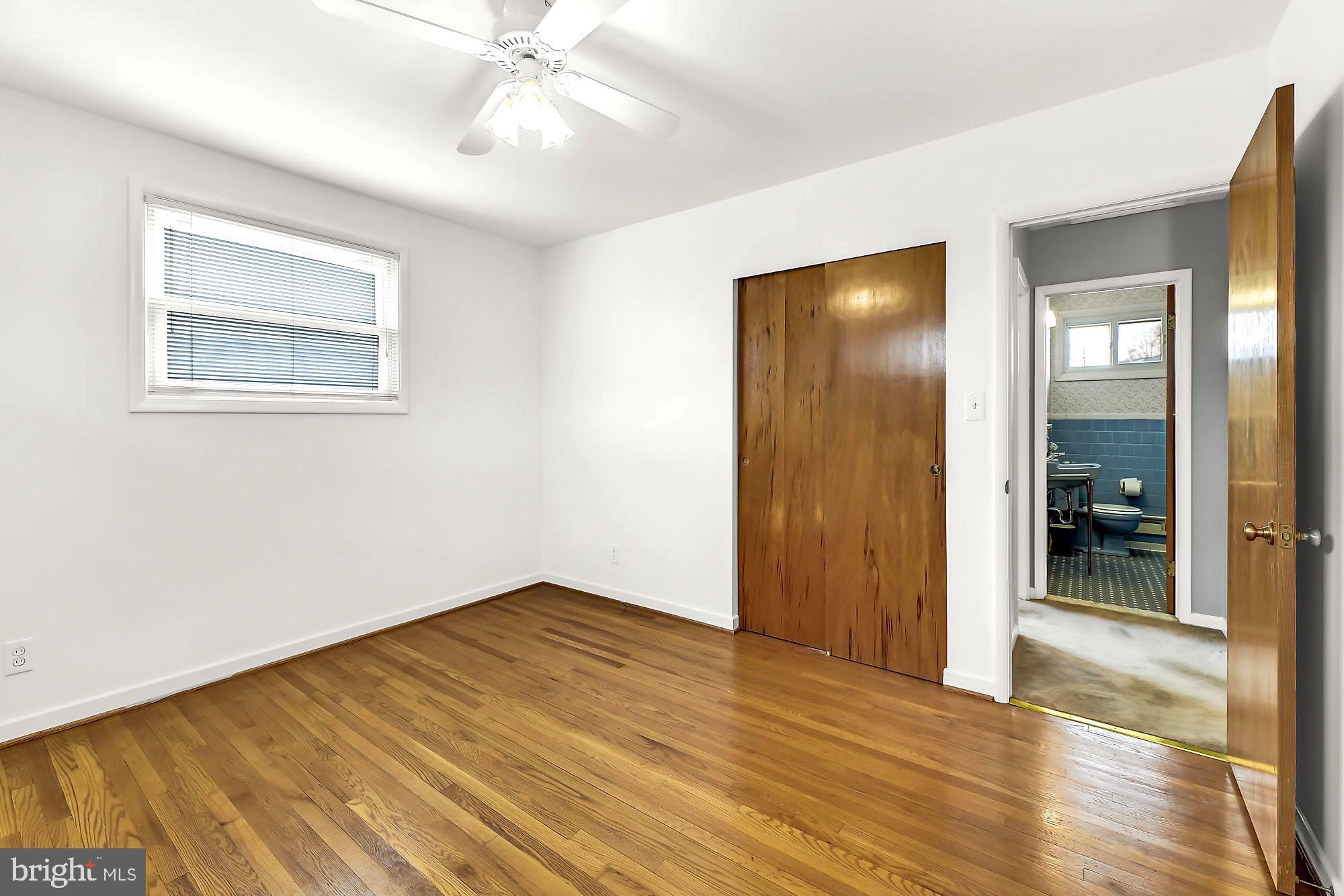 Spacious master with hardwoods