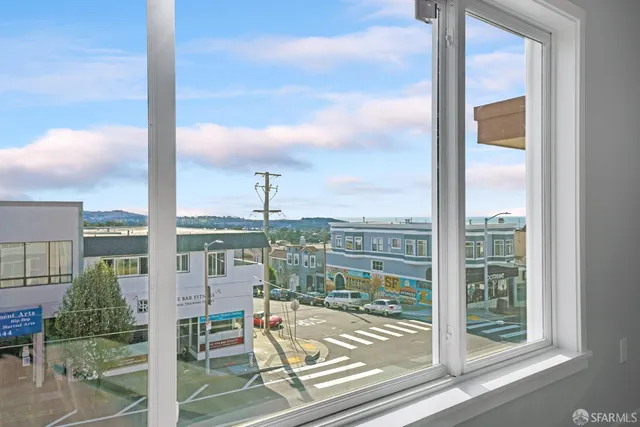 a view of a balcony with city view