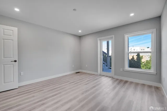 a view of a room that has a window in it