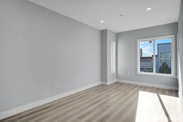 an aerial view of a city with lots of residential buildings