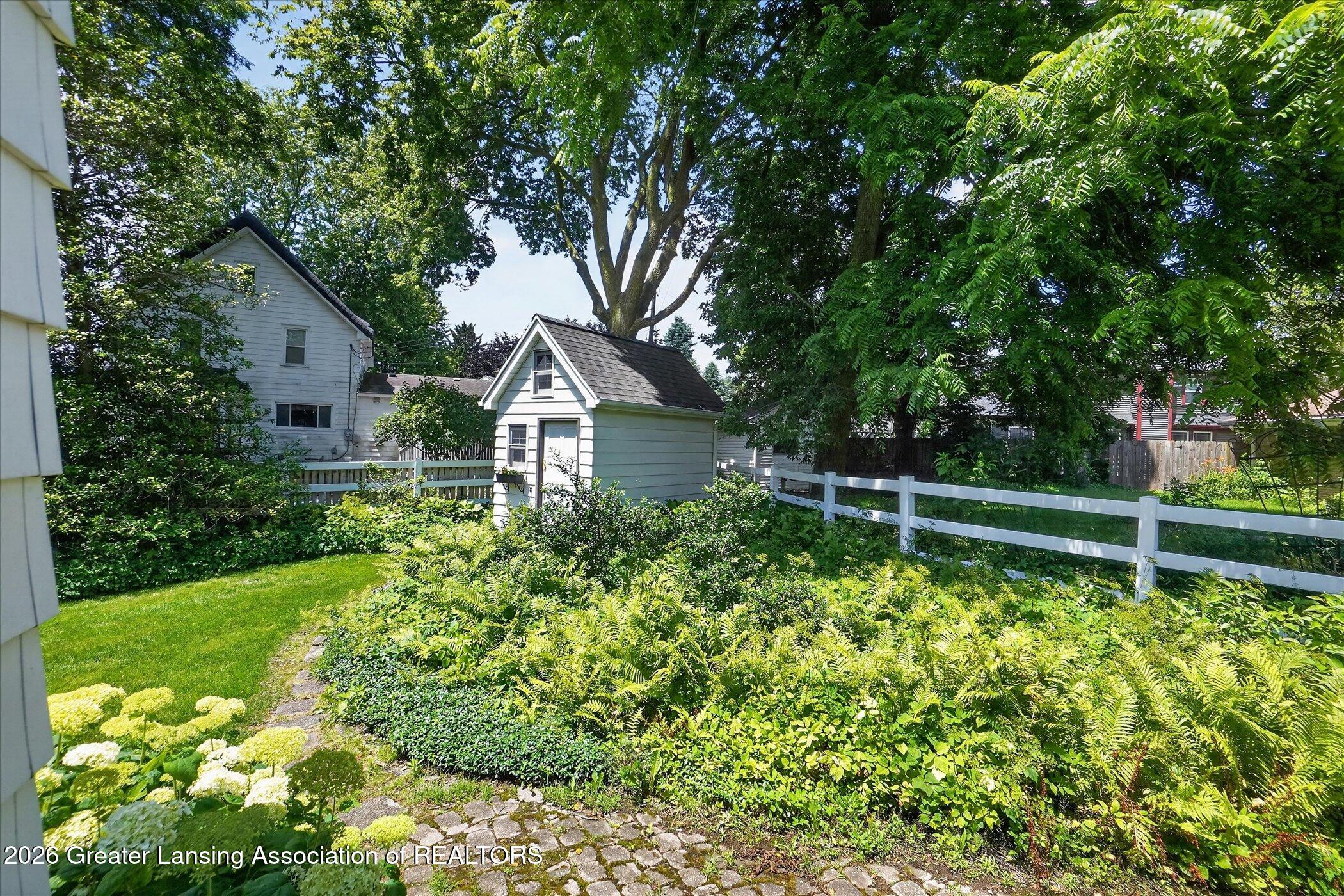 1716 Tecumseh River Road Lansing, MI 48906 - Photo 48 of 51 Side Yard