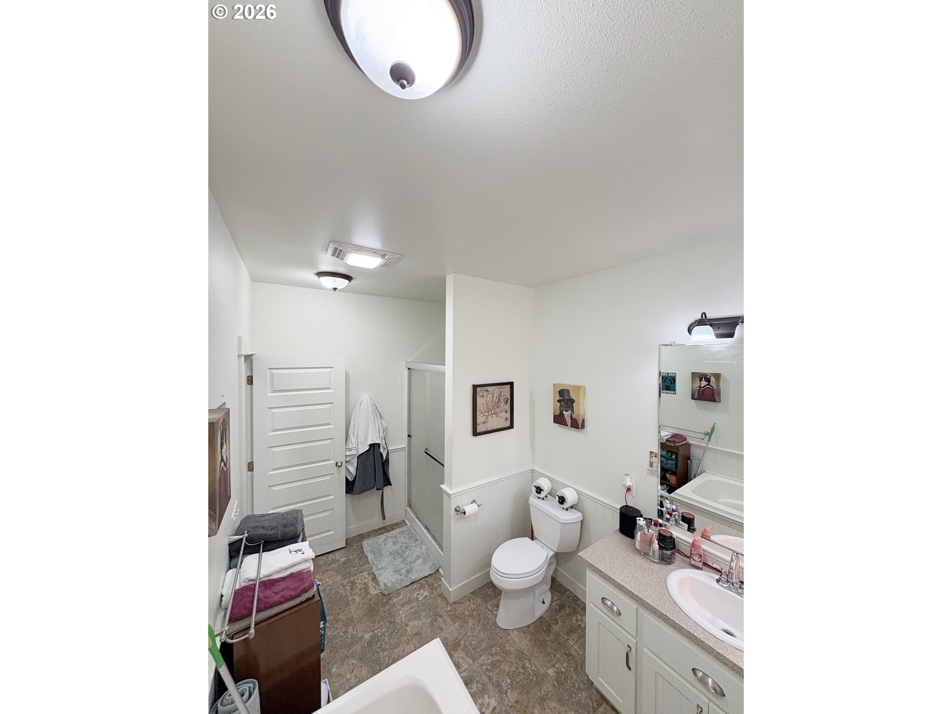 2090 Minnesota Street Eugene, OR 97402 - Photo 13 of 39 a living room with furniture and a painting on the wall