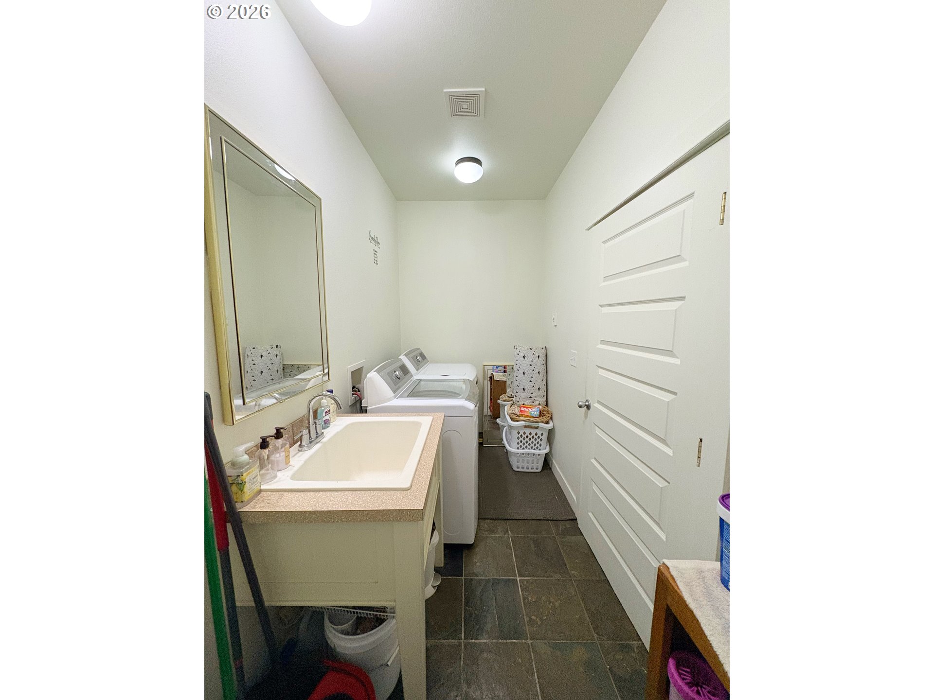 2090 Minnesota Street Eugene, OR 97402 - Photo 19 of 39 a bathroom with a sink and a mirror