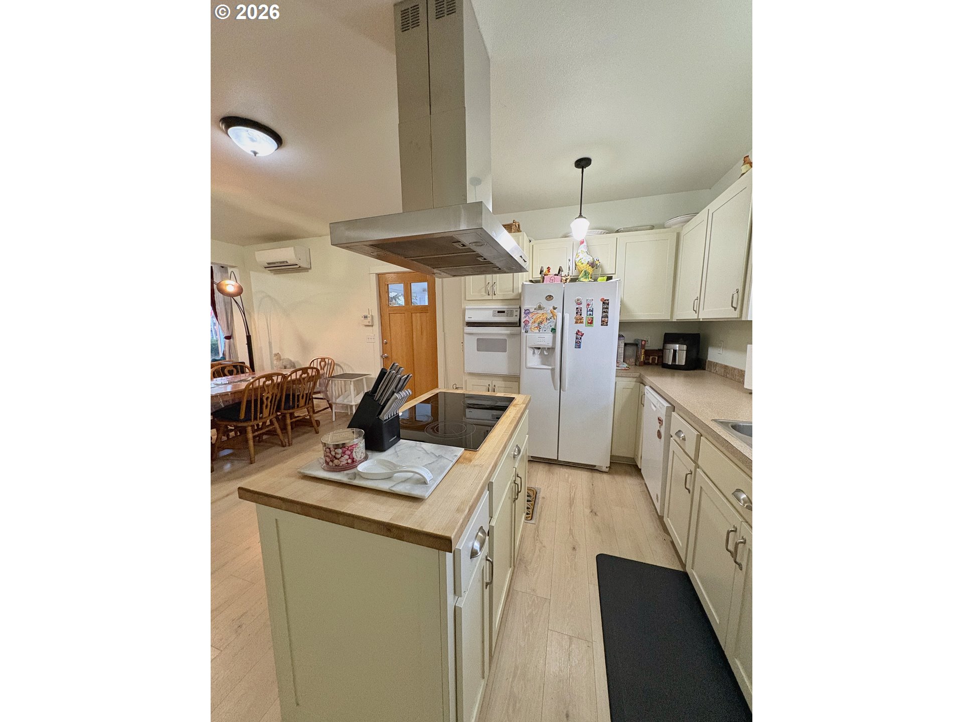 2090 Minnesota Street Eugene, OR 97402 - Photo 23 of 39 a kitchen with a sink stove and cabinets