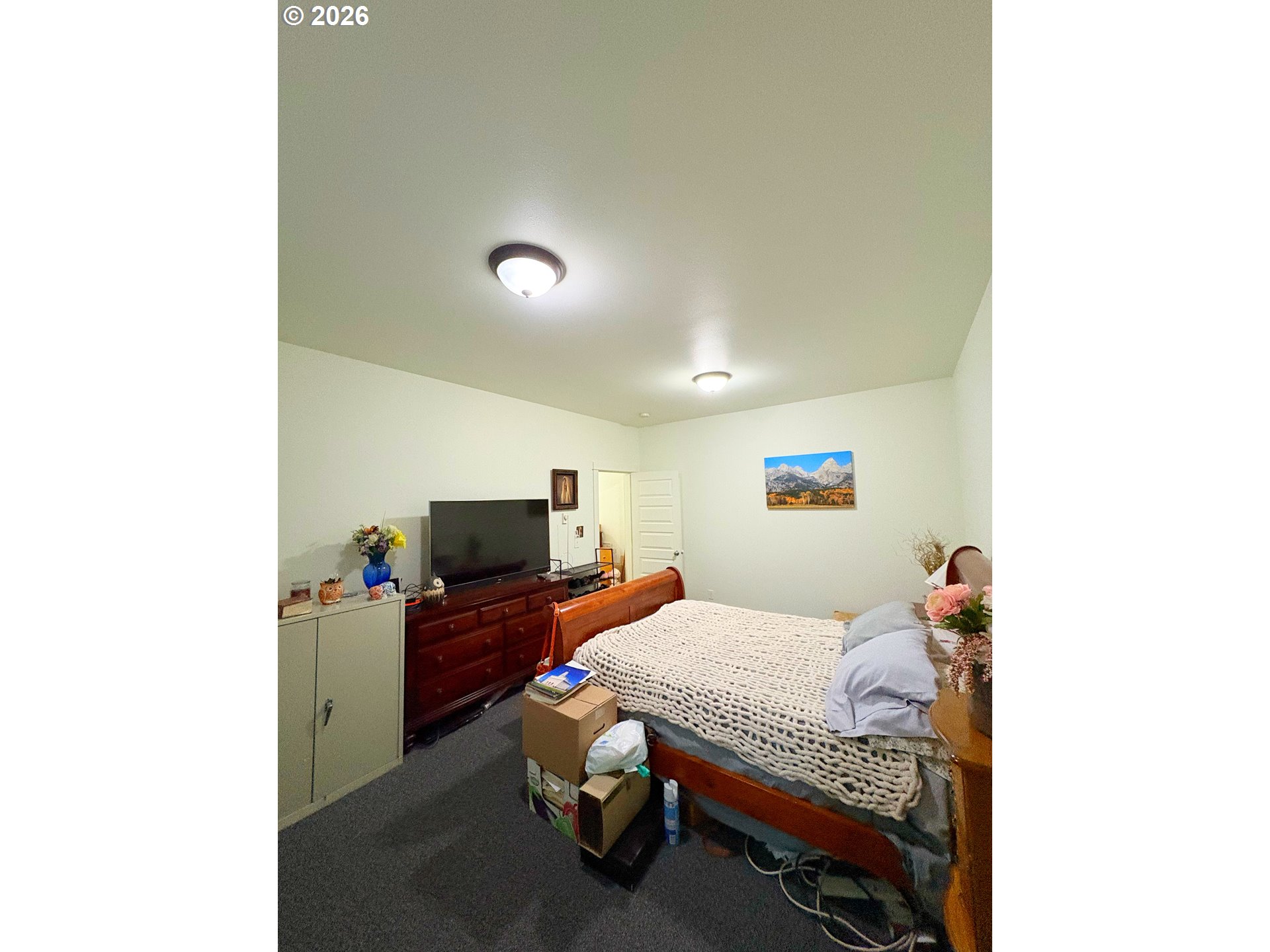 2090 Minnesota Street Eugene, OR 97402 - Photo 25 of 39 a bedroom with a bed and tv
