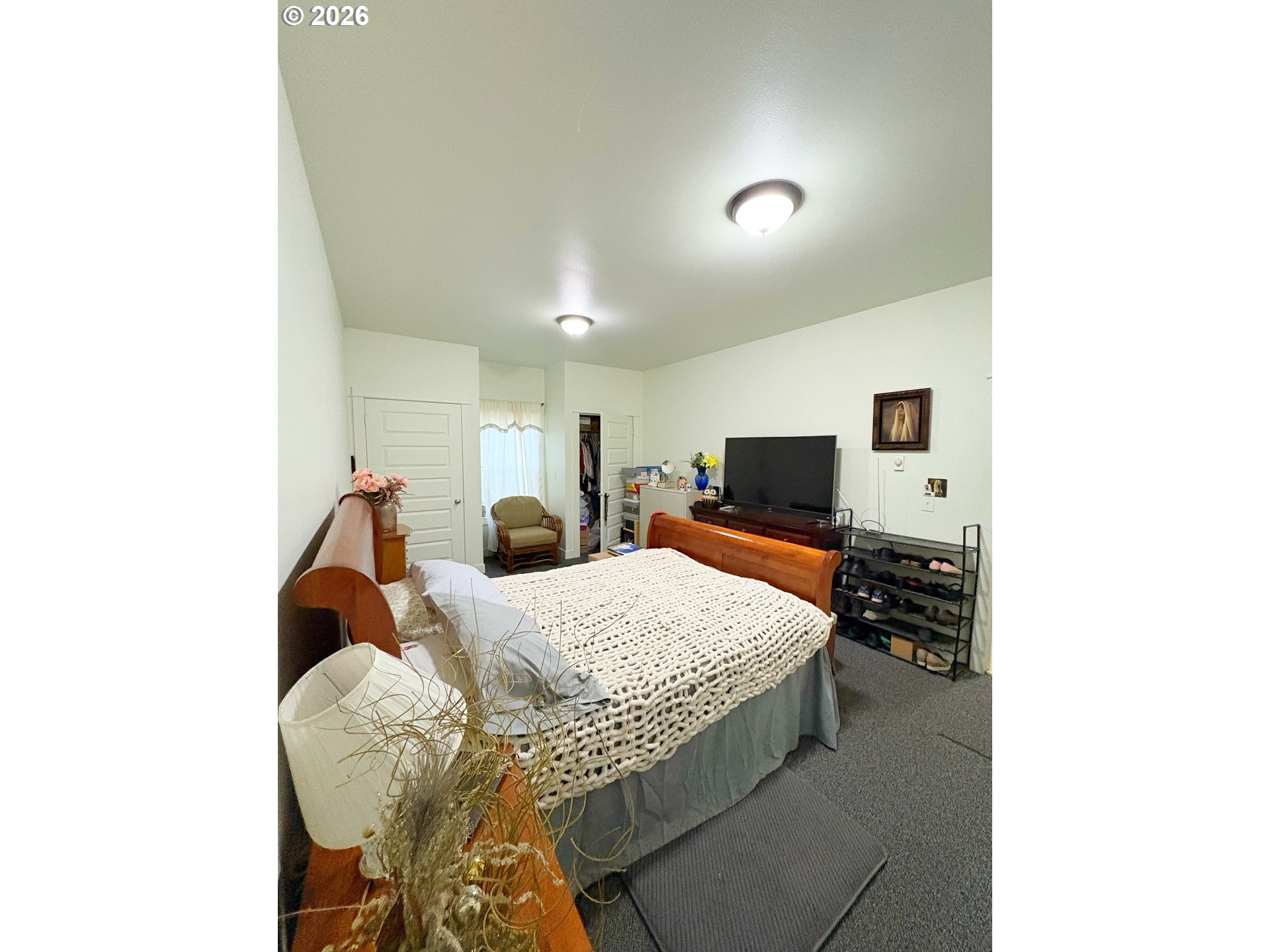 2090 Minnesota Street Eugene, OR 97402 - Photo 26 of 39 a living room with furniture and a flat screen tv