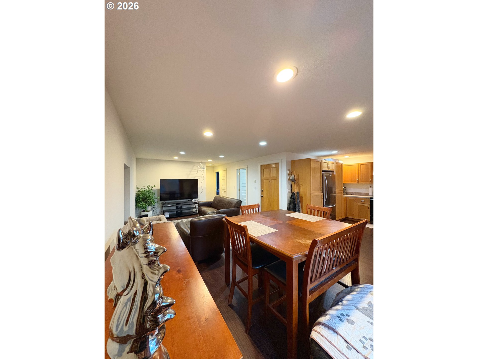 2090 Minnesota Street Eugene, OR 97402 - Photo 29 of 39 a living room with stainless steel appliances kitchen island granite countertop a sink and cabinets