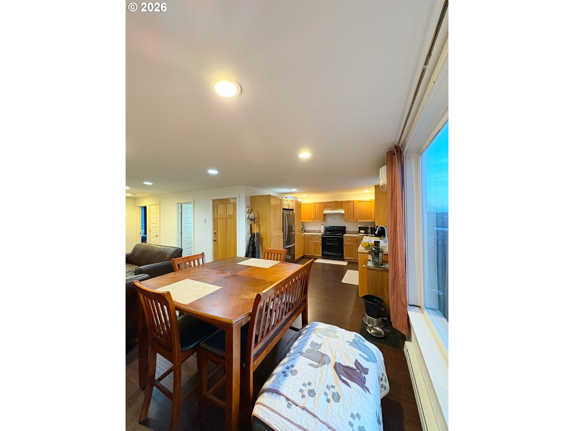 2090 Minnesota Street Eugene, OR 97402 - Photo 30 of 39 a dining room with a table and chairs