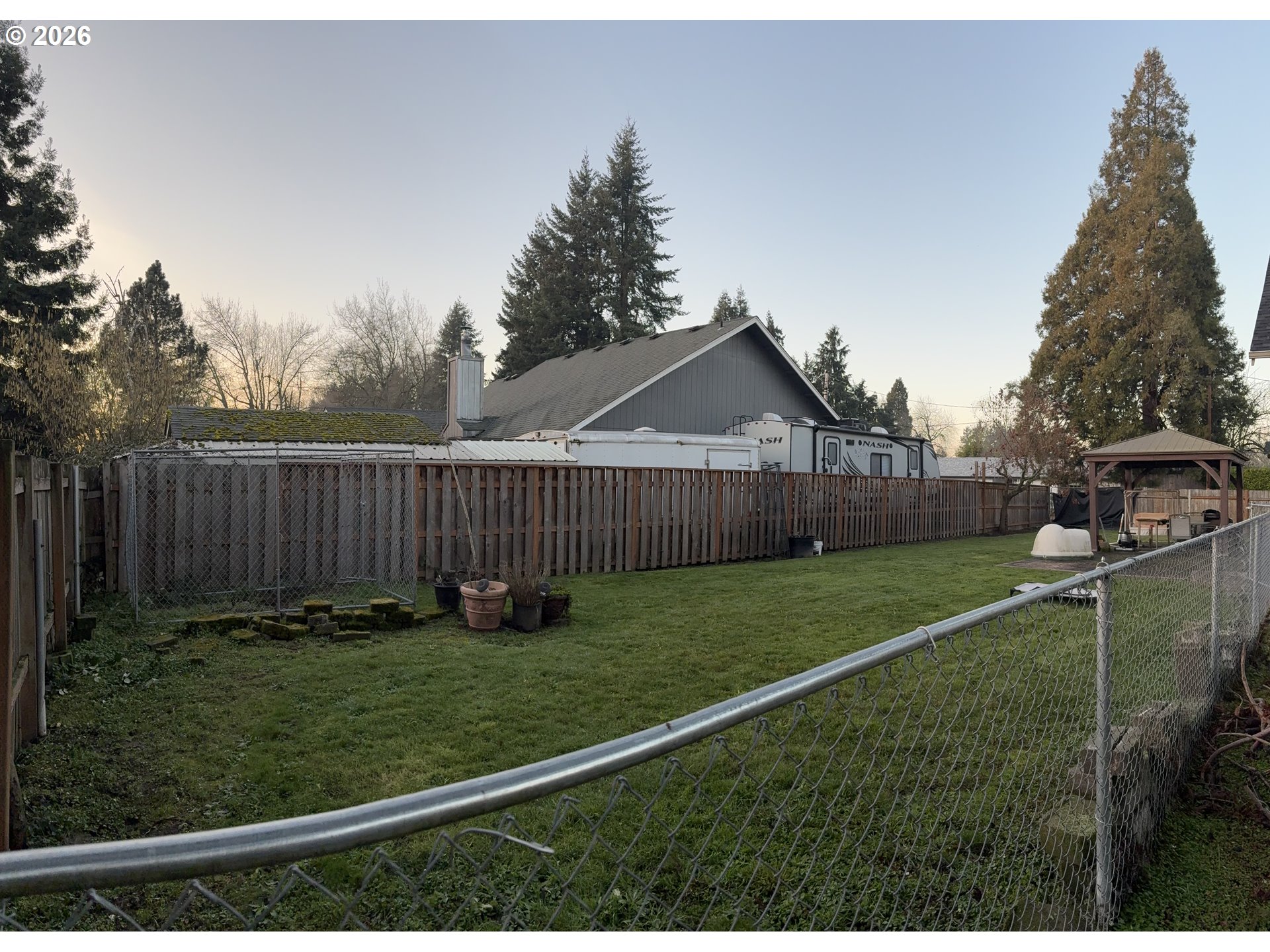 2090 Minnesota Street Eugene, OR 97402 - Photo 6 of 39 a view of a backyard with wooden fence