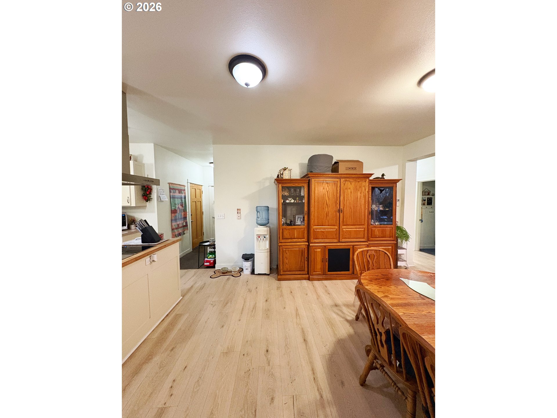 2090 Minnesota Street Eugene, OR 97402 - Photo 9 of 39 a kitchen with stainless steel appliances kitchen island granite countertop a refrigerator and microwave