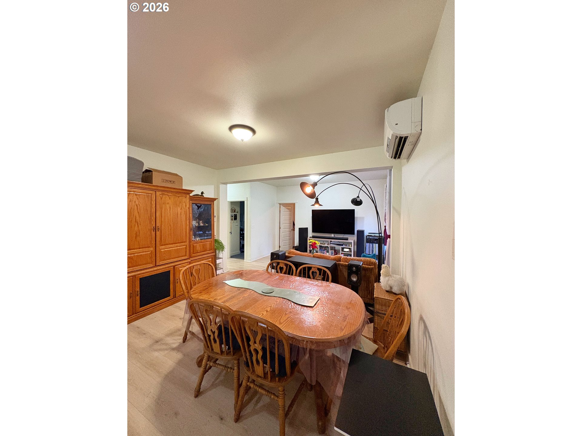 2090 Minnesota Street Eugene, OR 97402 - Photo 10 of 39 a dining room with furniture and a flat screen tv