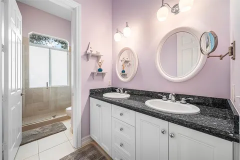 a view of a livingroom with workspace and a window