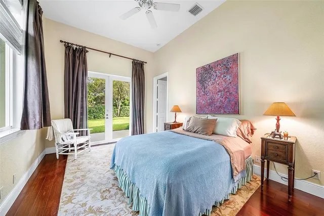 a kitchen with a sink a washer and dryer next to a window