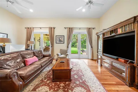 a room with furniture and a flat screen tv