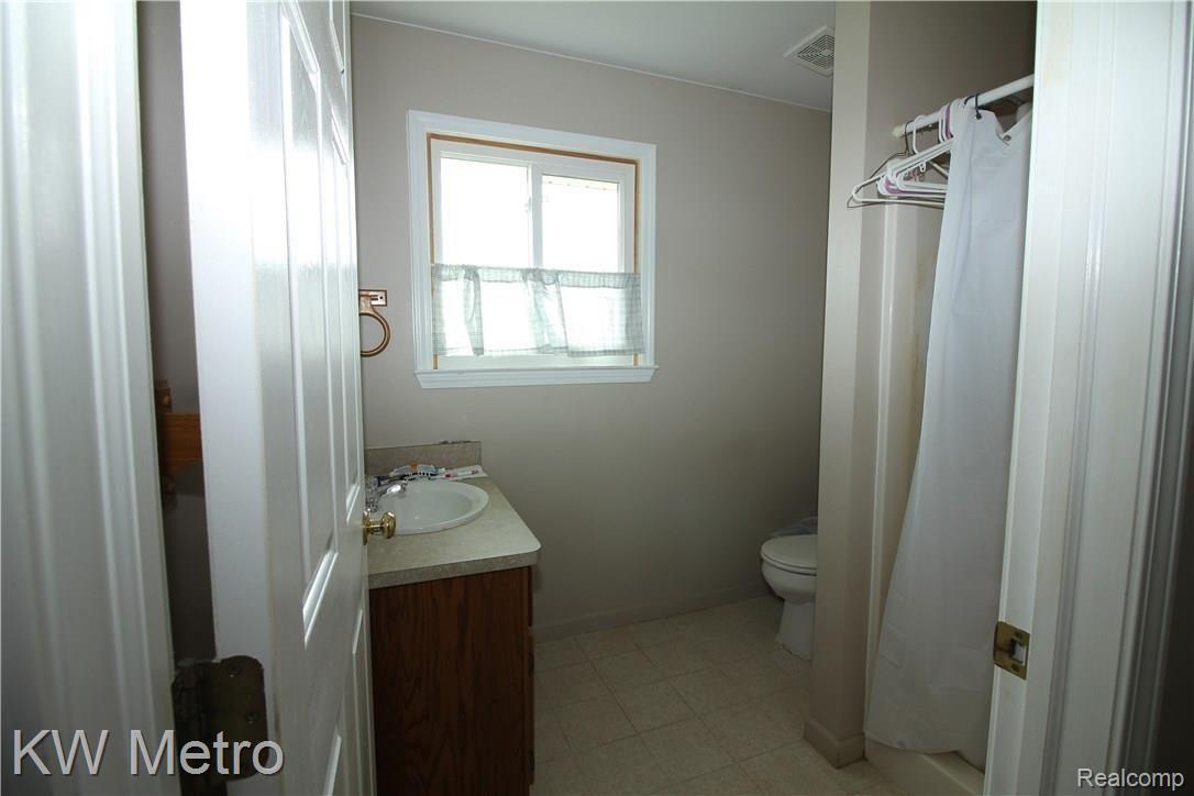 900 Miller Road Memphis, MI 48041 - Photo 23 of 28 Bathroom off kitchen