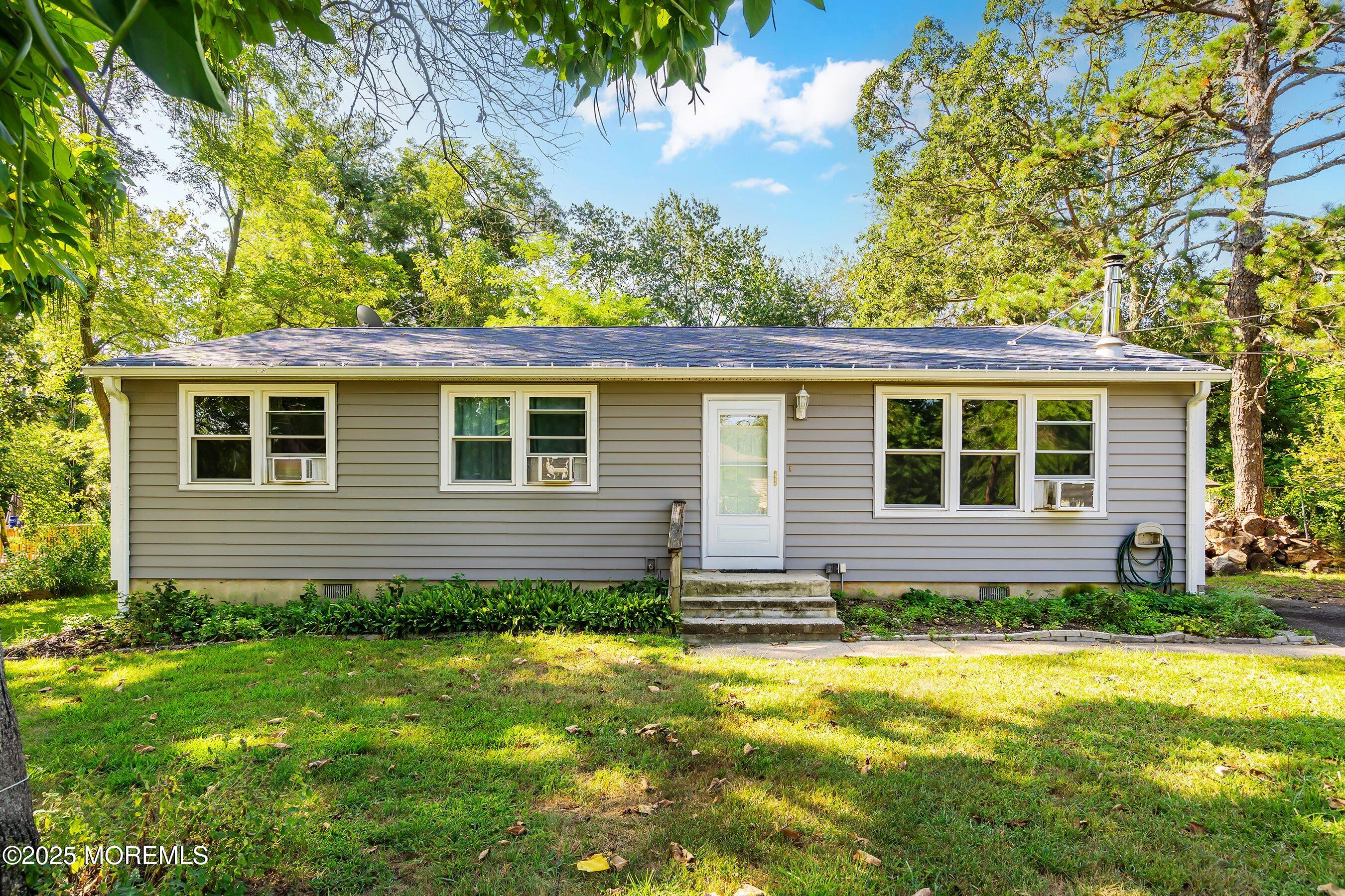 a house view with a garden space