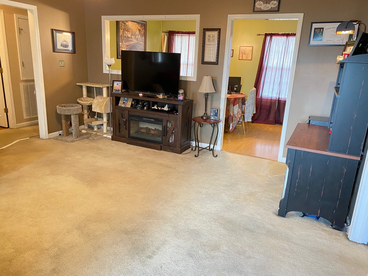 2102 Bennett Court Columbia, TN 38401 - Photo 18 of 19 a living room with furniture and a flat screen tv