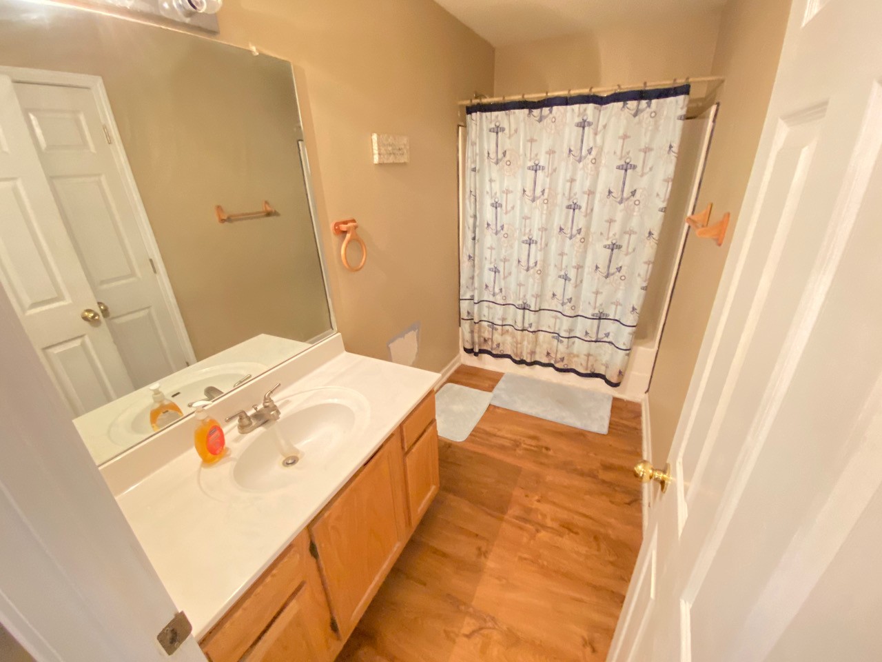 2102 Bennett Court Columbia, TN 38401 - Photo 6 of 19 a en suite bathroom with a sink and a shower curtain