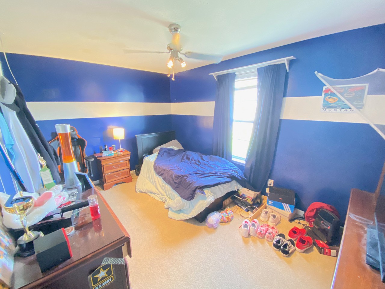 2102 Bennett Court Columbia, TN 38401 - Photo 7 of 19 a bedroom with furniture and a chandelier