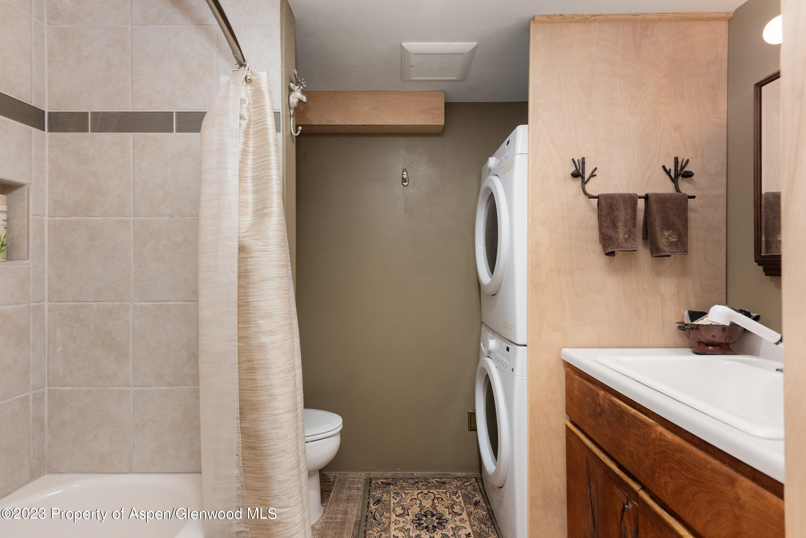 4275 Sopris Mountain Ranch Road Basalt, CO 81621 - Photo 20 of 36 a bathroom with a sink toilet and shower