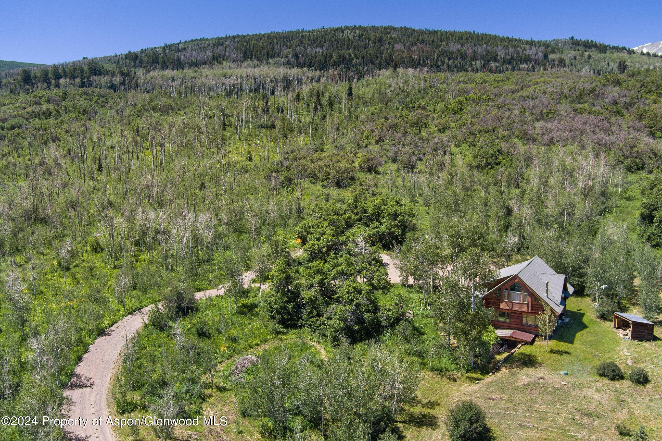 4275 Sopris Mountain Ranch Road Basalt, CO 81621 - Photo 30 of 36 an aerial view of a house with mountain view
