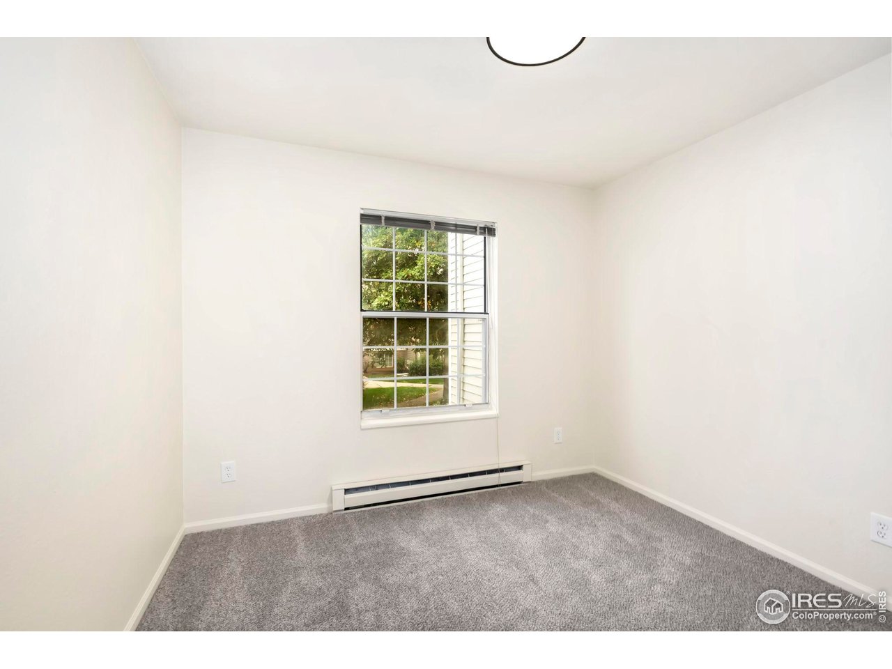 2828 Silverplume Drive, Unit R3 Fort Collins, CO 80526 - Photo 24 of 45 a view of an empty room with a window
