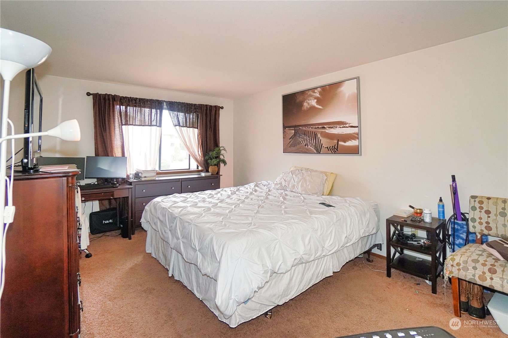24914 109th Place Southeast, Unit 34C Kent, WA 98030 - Photo 15 of 38 a bed room with a bed and a chair