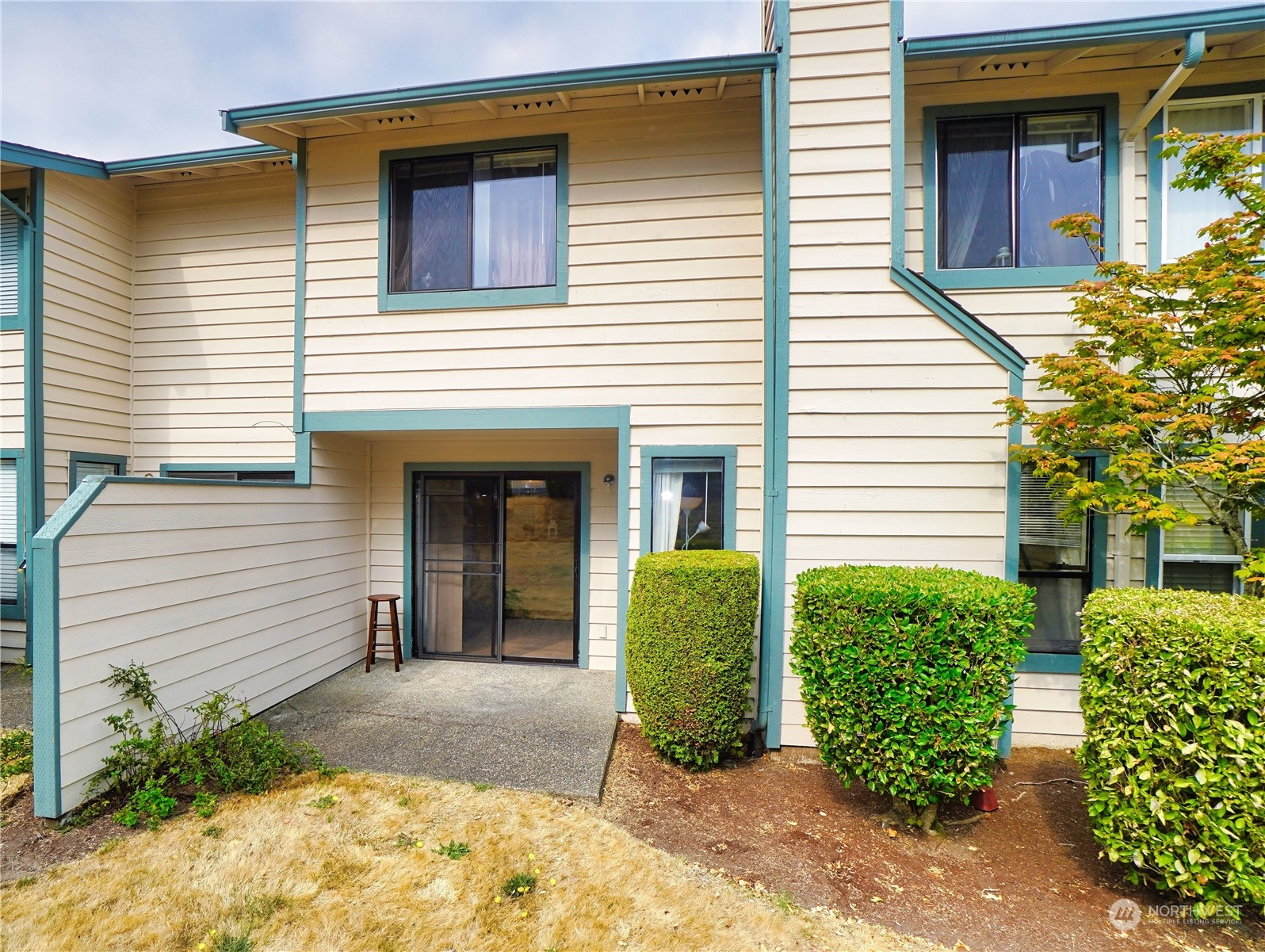 24914 109th Place Southeast, Unit 34C Kent, WA 98030 - Photo 30 of 38 a view of a house with potted plants