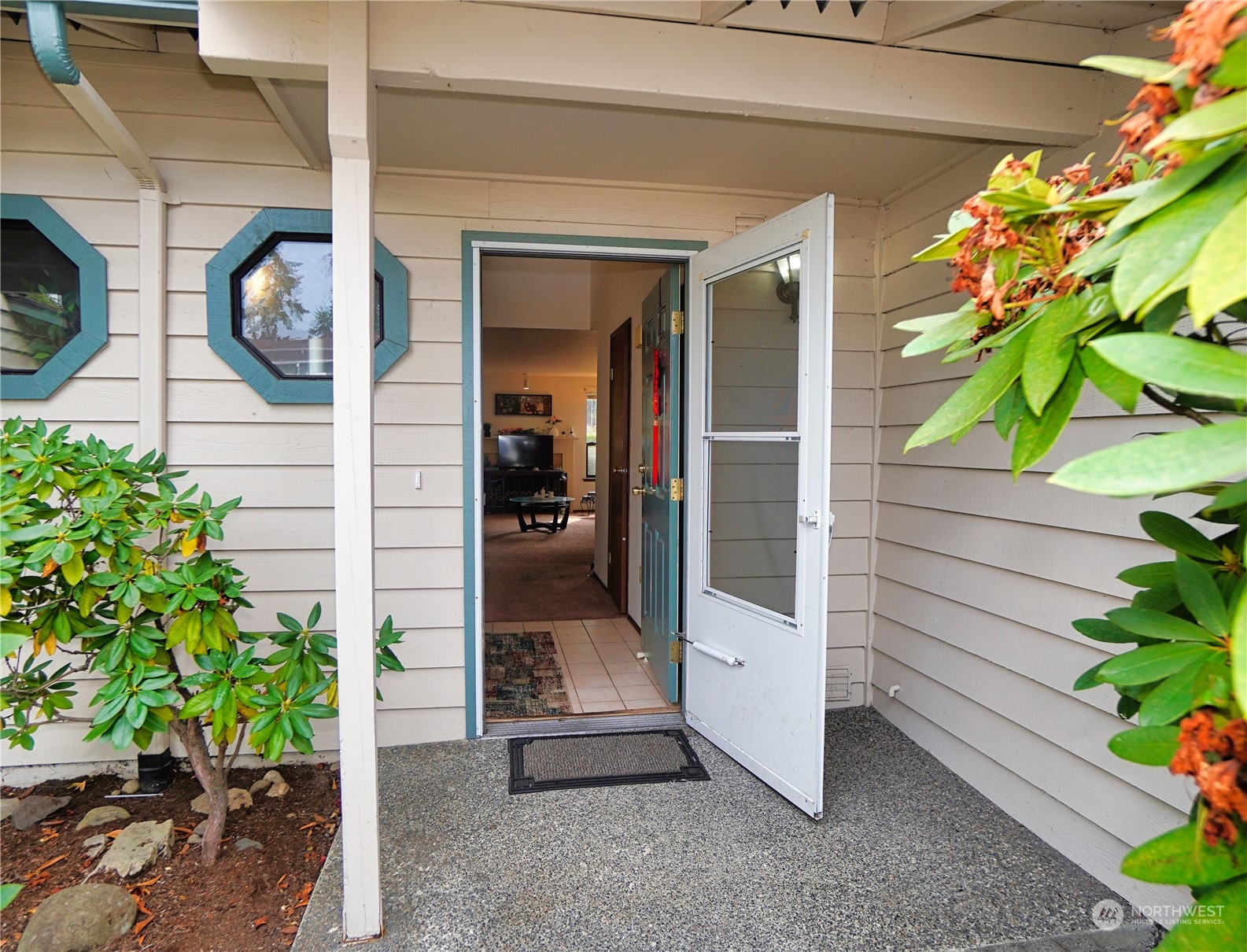 24914 109th Place Southeast, Unit 34C Kent, WA 98030 - Photo 3 of 38 a view of a pathway of a house front of house