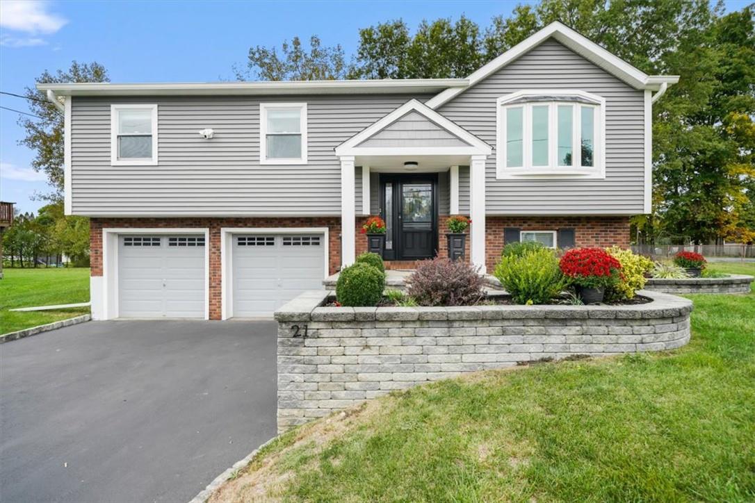 21 Knights Circle Newburgh, NY 12550 - Photo 1 of 1 a front view of a house with plants
