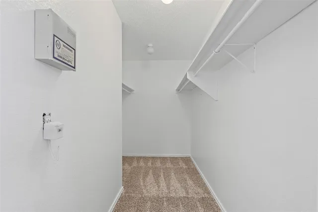 a bathroom with a double vanity sink a mirror and a shower