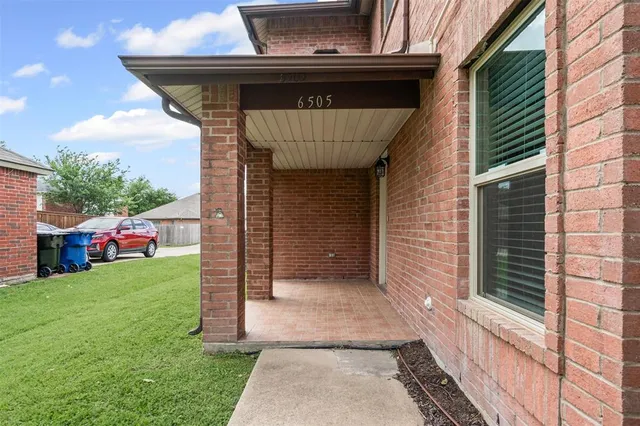 a view of a house with a porch