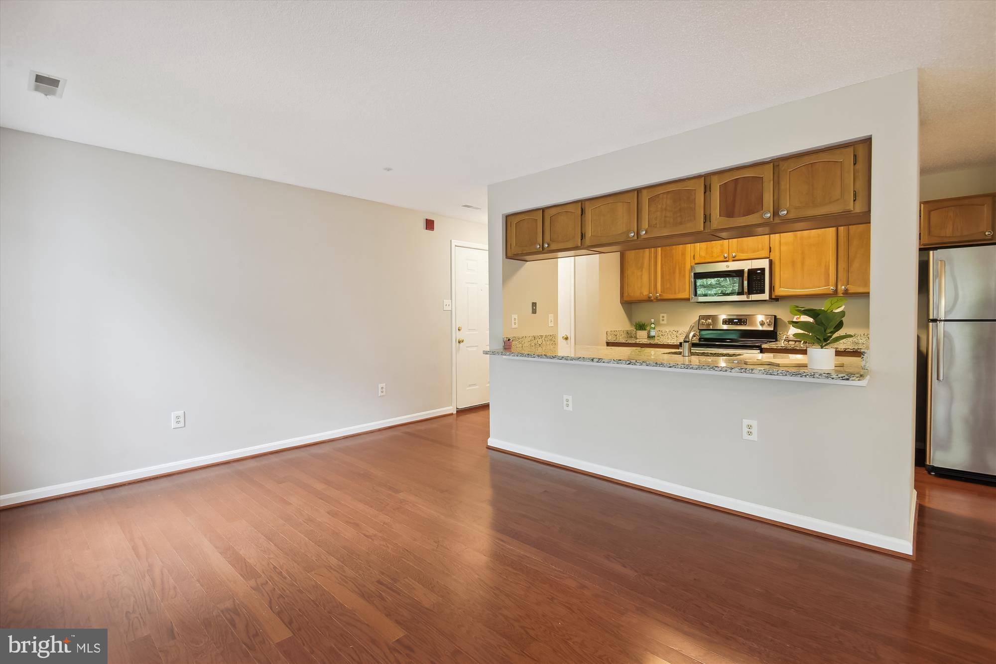 2600 Camelback Lane, Unit 7 Silver Spring, MD 20906 - Photo 10 of 36 Breakfast Bar With Pass Through To Kitchen