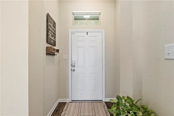 a view of a hallway with closet
