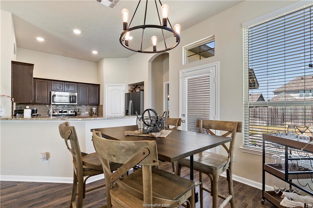 2000 Bleeker Cove Bryan, TX 77807 - Photo 8 of 24 a view of a dining room with furniture and window