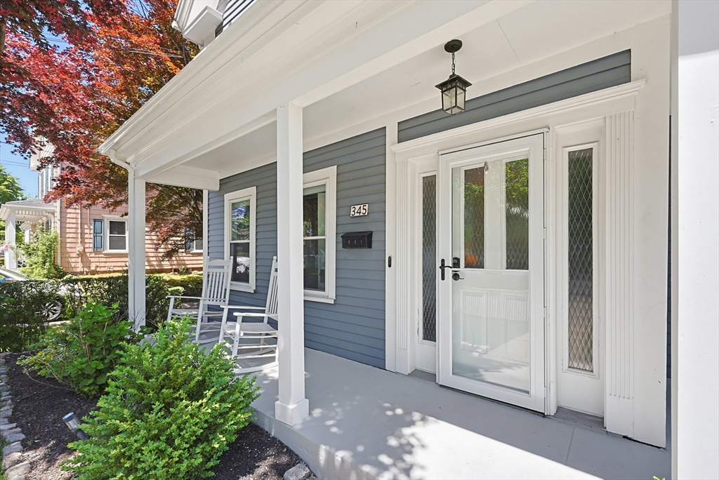 345 Sherman Street Canton, MA 02021 - Photo 41 of 42 a front view of a house with a glass windows