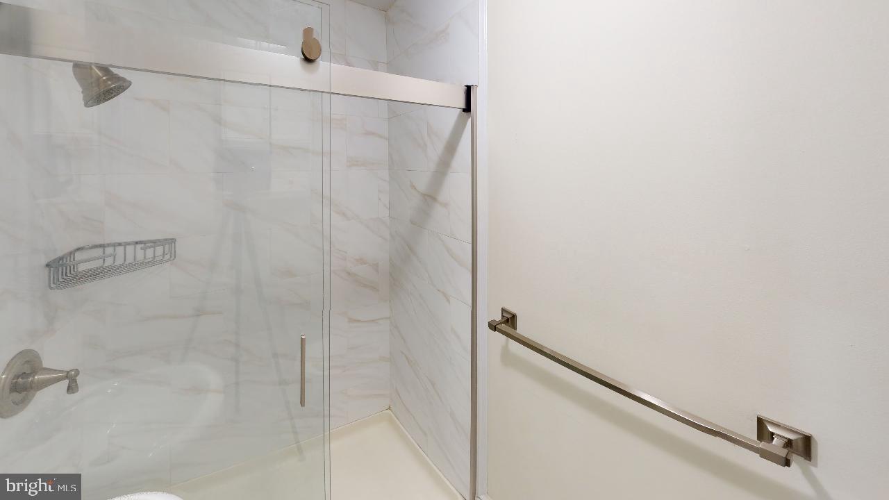 2312 Locust Street, Unit 2R Philadelphia, PA 19103 - Photo 12 of 13 a bathroom with a shower