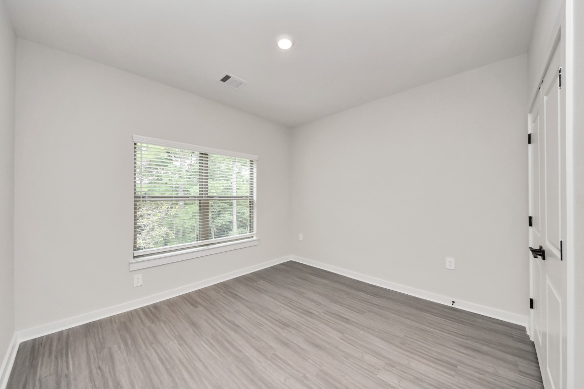 7711 Longmire Road, Unit 155 Conroe, TX 77304 - Photo 12 of 48 Bedroom 3 with Closet