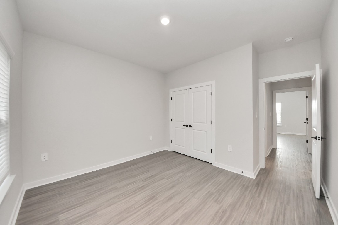 7711 Longmire Road, Unit 155 Conroe, TX 77304 - Photo 13 of 48 Bedroom 3 with Closet