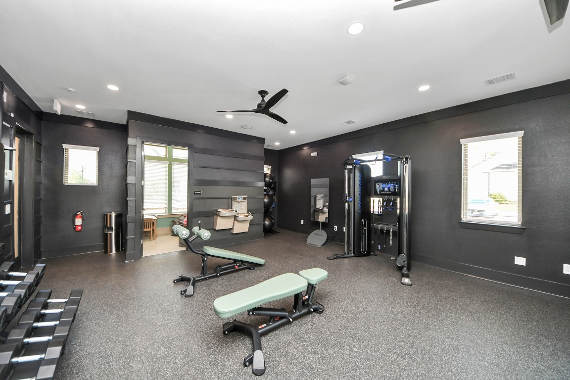 7711 Longmire Road, Unit 155 Conroe, TX 77304 - Photo 32 of 48 Enjoy an abundance of Amenities:Resort-Style Pool w/Sundeck Ledge&Outdoor Lounge Areas w/Grilling area,Gaming Lawn,Pickleball Court,Quaint Dog Park for your fur babies!24/7 Fitness Center w/Kids Play Zone area.Stunning Clubhouse w/Café/Lounge.Playground Area.Electric Vehicle Charging Stations!